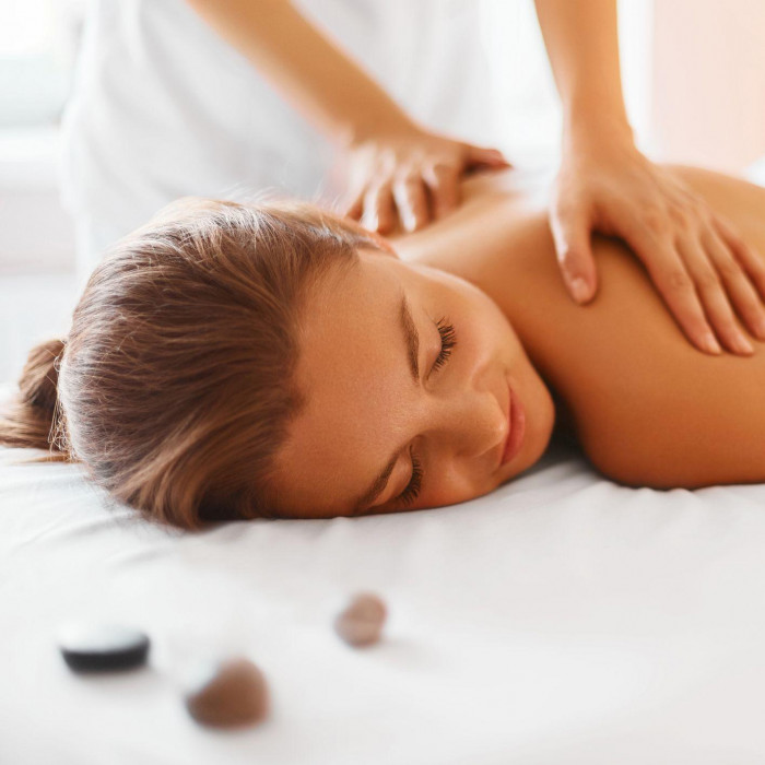 spa-woman-female-enjoying-massage-in-spa-centre-royalty-free-image-492676582-1549988720.jpg